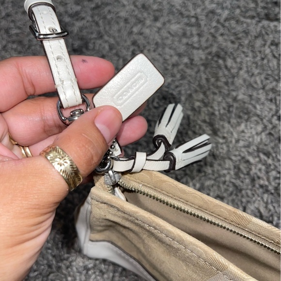 Coach Signature Stripe Tan/Brown Zip Top
Wristlet Wallet with adjustable Handle - Picture 11 of 11